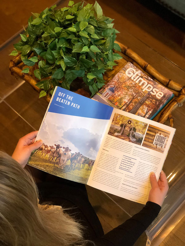 Glimpse Magazine being read at a coffee table